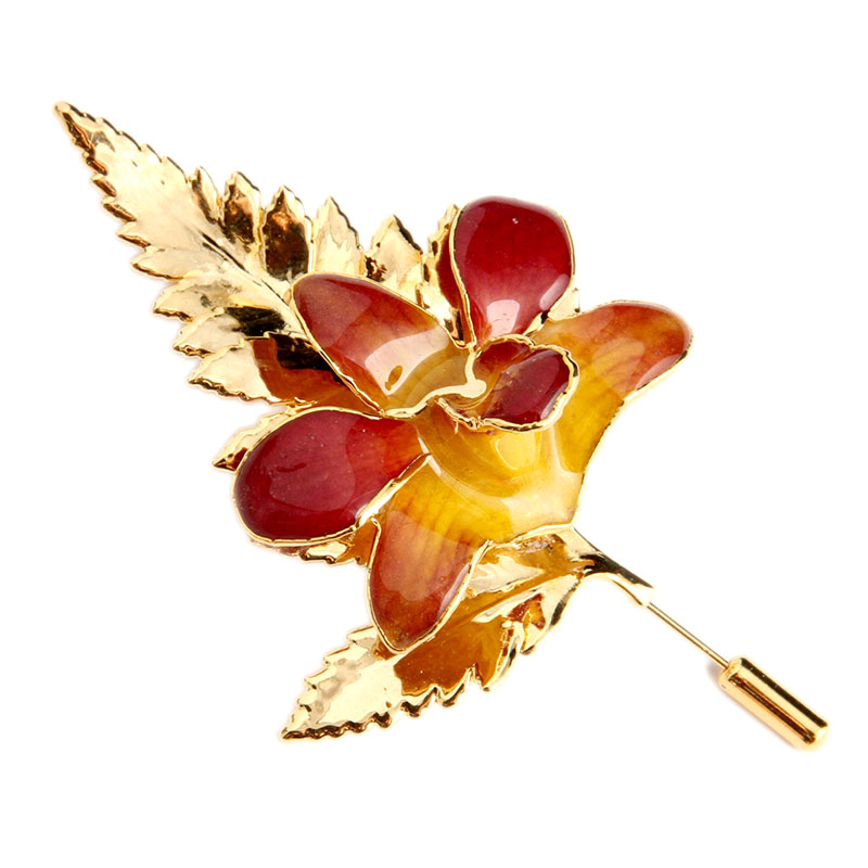 Брошь из орхидеи с золотой окантовкой на листе папоротника Яблочный пай